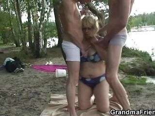 grandma goes wild with two cocks